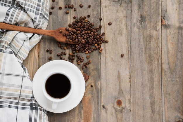 Top view coffee cup on wooden background