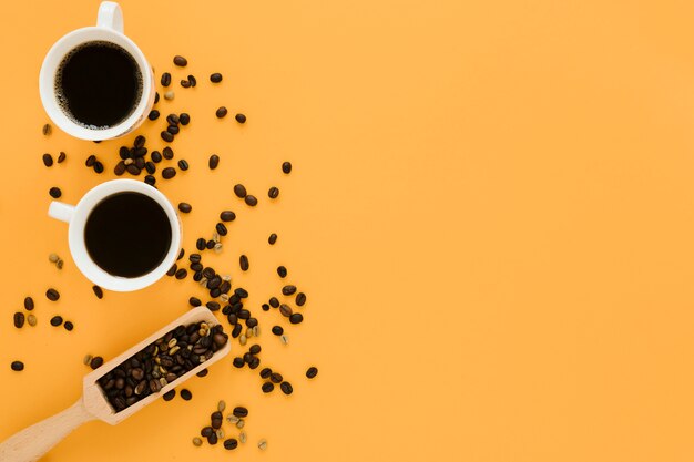 Top view of coffee cups with coffee shovel