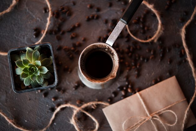 Top view coffee kettle with roasted beans