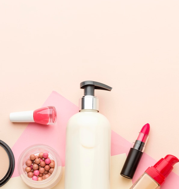 Top view collection of beauty products with copy space