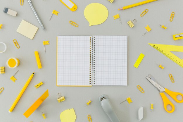 Top view collection of stationery objects on the table