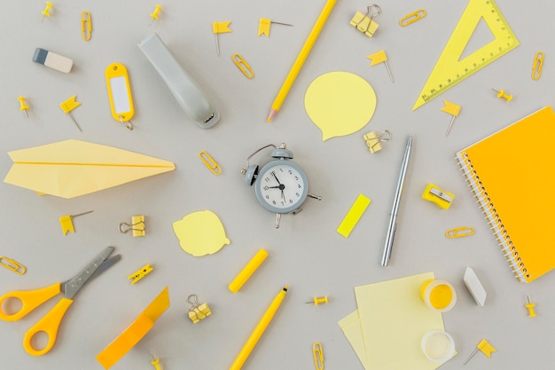 Top view collection of stationery objects on the table