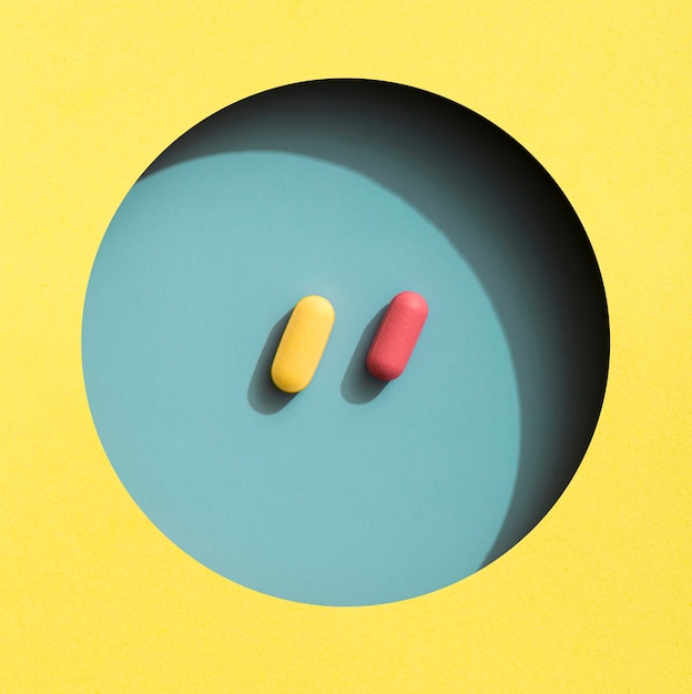 Top view of colored pills in circle
