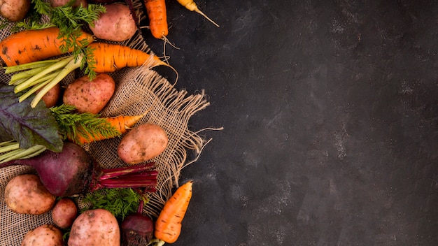 Top view colorful arrangement of vegetables with copy space