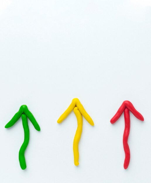 Top view of colorful arrows pointing up