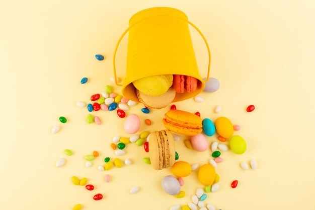 A top view colorful candies with french macarons