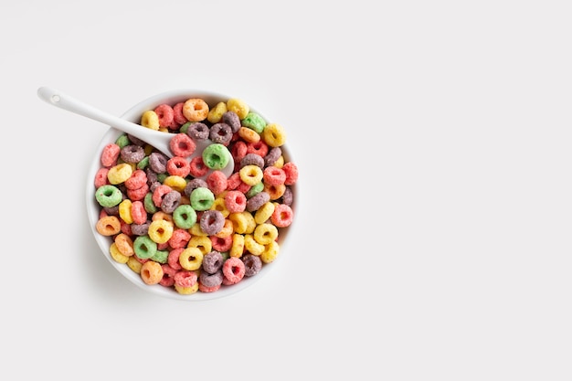 Top view colorful cereal bowl and spoon