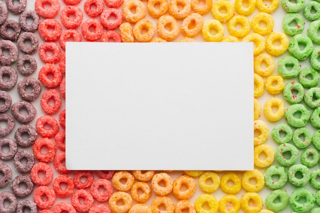 Free photo top view colorful cereal with mock-up