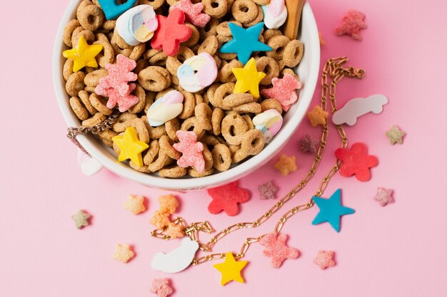 Top view colorful cereals in white bowl