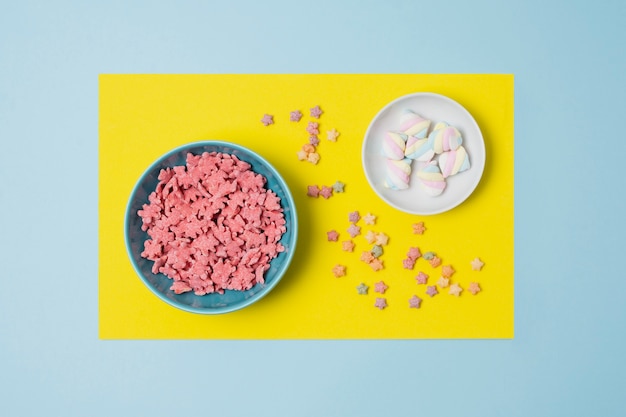 Free photo top view colorful cereals with bowls