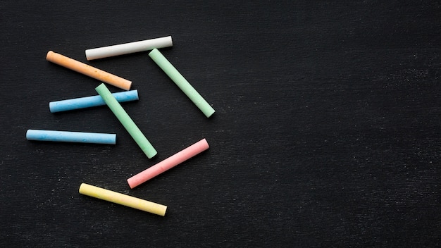 Top view of colorful chalk with copy-space