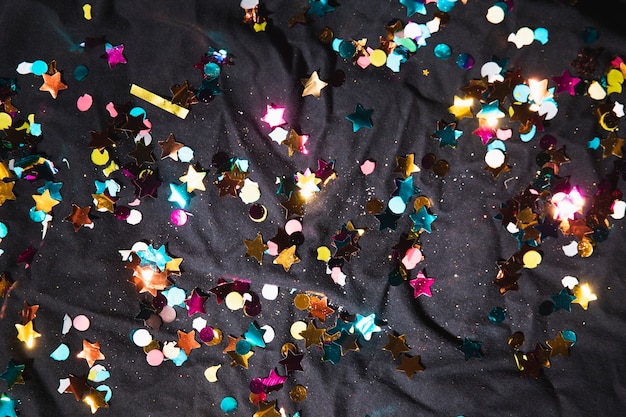 Free photo top view colorful confetti for party