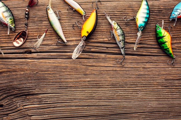 Top view of colorful fishing bait with copy space