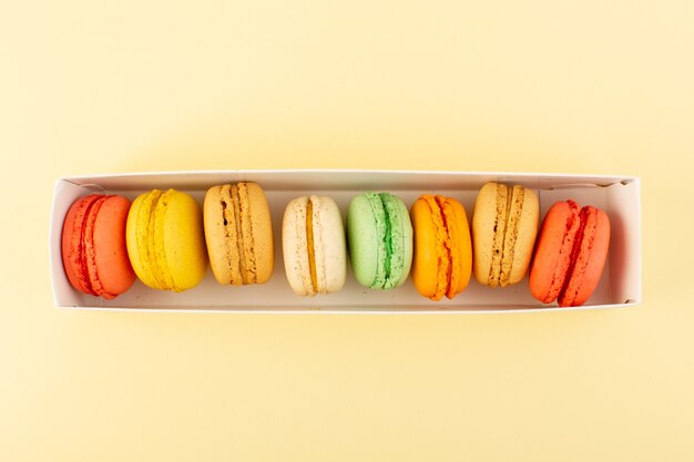 A top view colorful french macarons bake