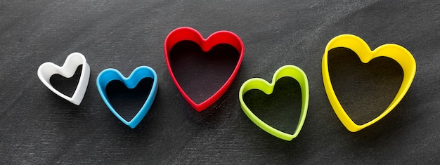 Free photo top view of colorful heart shapes