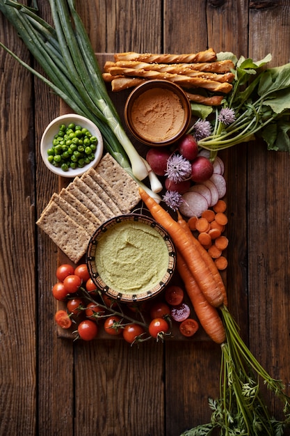 Free photo top view over colorful hummus