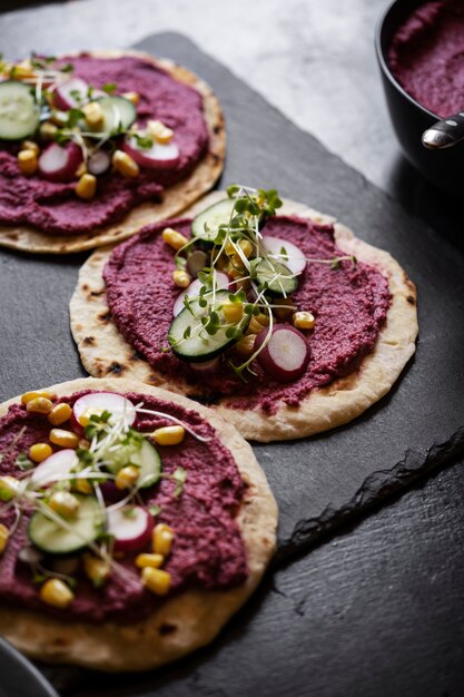 Top view over colorful hummus