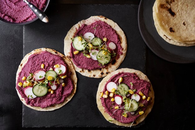 Top view over colorful hummus