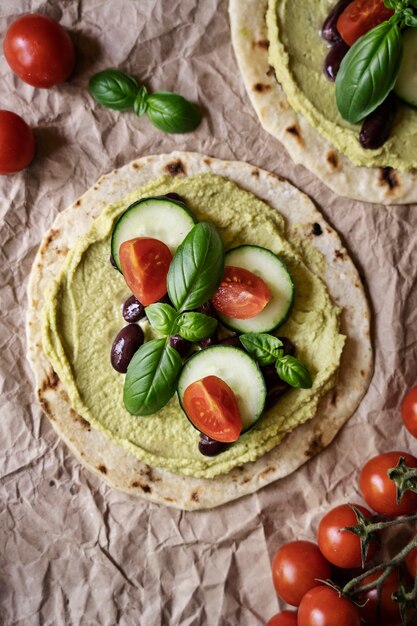 Free photo top view over colorful hummus