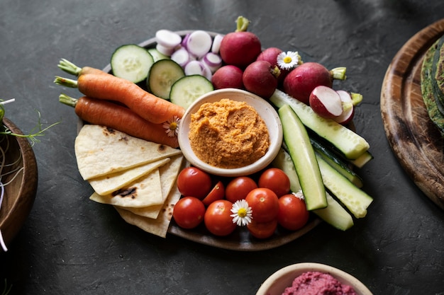 Top view over colorful hummus