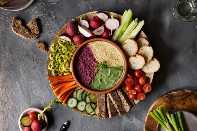 Top view over colorful hummus