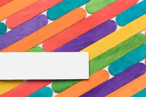 Free photo top view colorful ice cream sticks arrangement