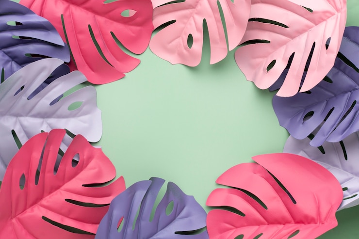 Free Photo top view colorful leaves with green background
