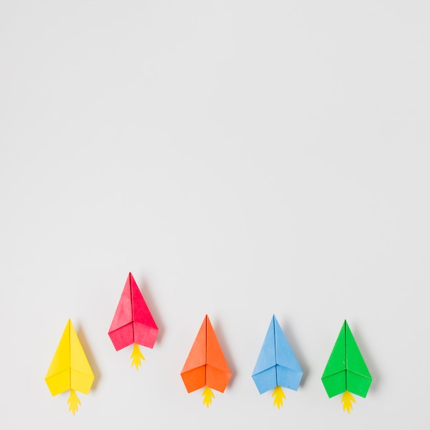 Free photo top view colorful paper planes