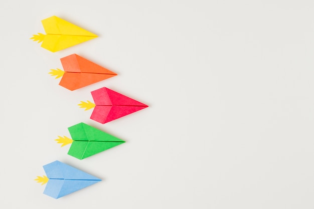 Top view colorful paper planes