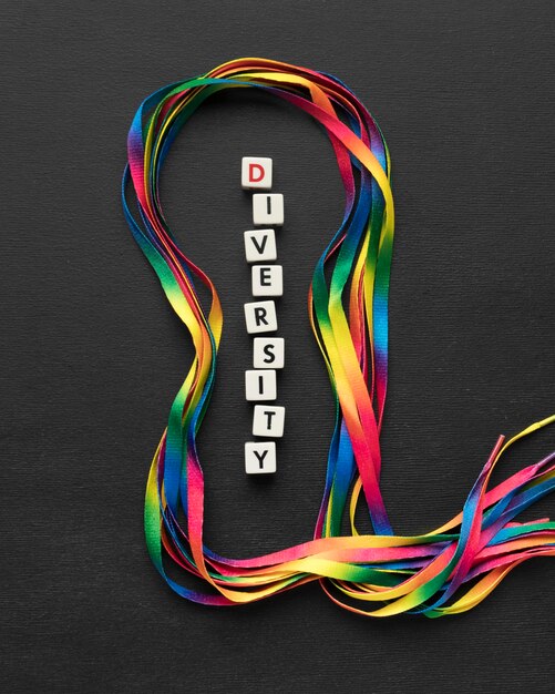 Top view colorful shoelaces arrangement on dark background