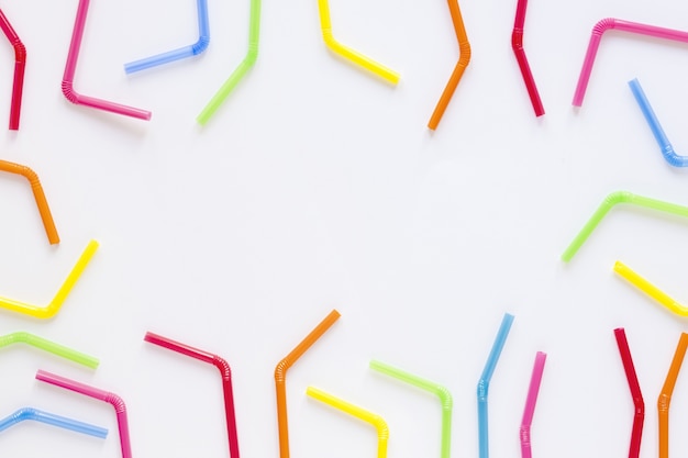 Free photo top view colorful straw collection
