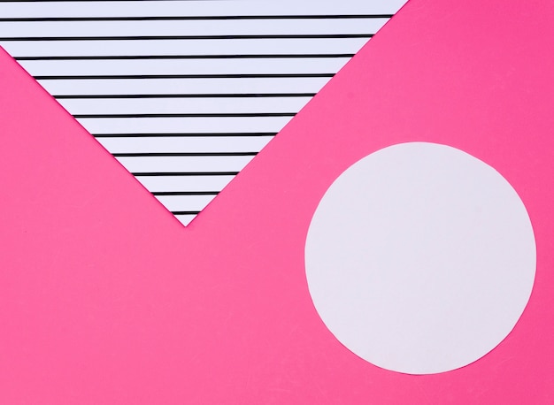 Top view of colourful geometric paper shapes