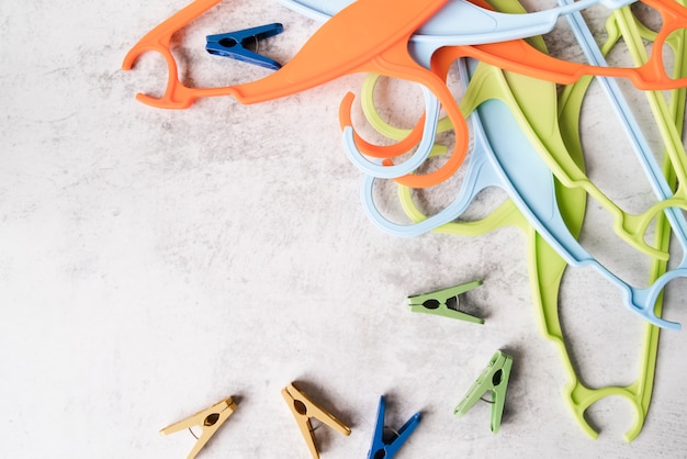 Top view colourful hangers with pegs