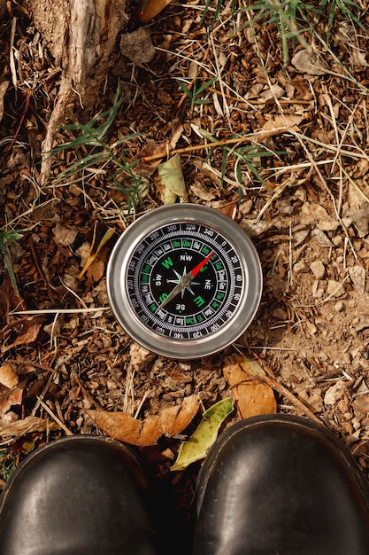 Free photo top view compass for directions on field