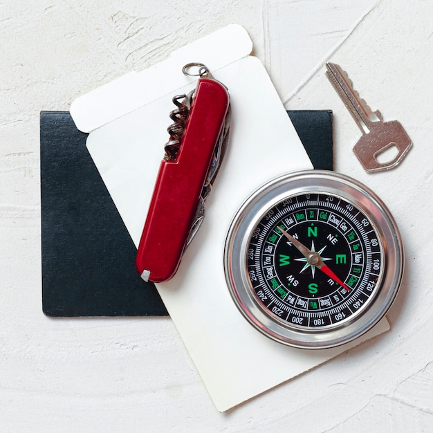 Top view compass, key and knife