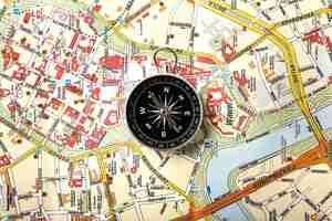 Free photo top view compass on map