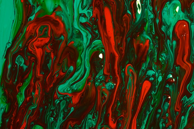 Вид сверху композиция с красной и зеленой краской