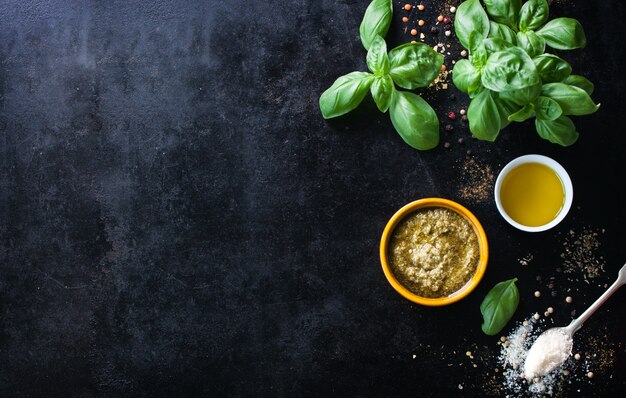 Top view of condiments and aromatic herbs