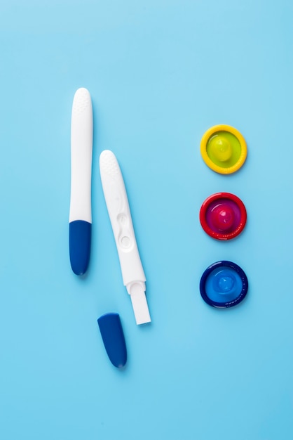 Top view condoms and pregnancy tests