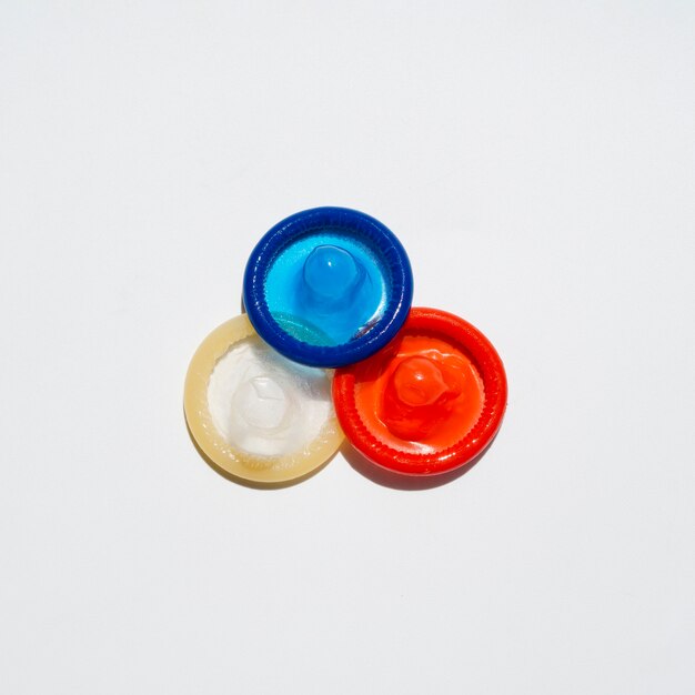 Top view condoms with white background and copy-space