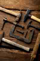 Free photo top view  construction hammers still life