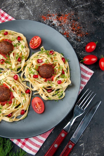 Top view cooked dough slices with meatballs on gray background color meat restaurant cooking dish pasta