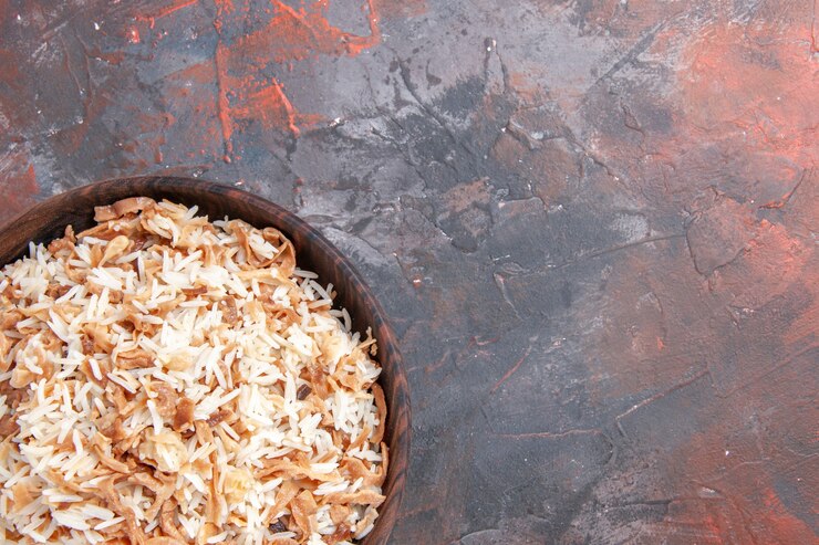 Free Photo top view cooked rice with dough slices on dark floor dish meal dark food pasta