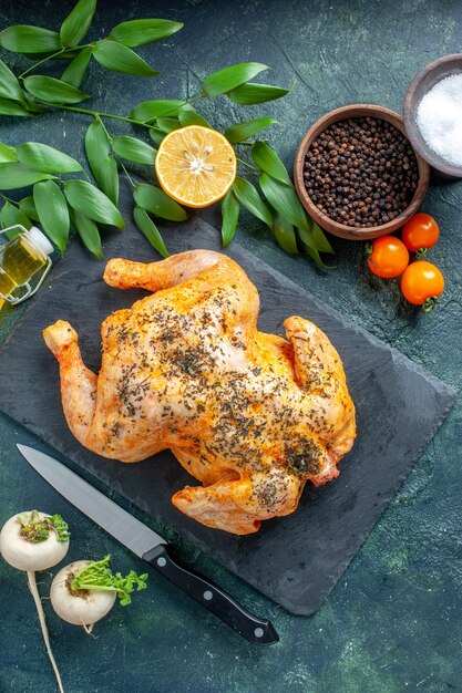 Top view cooked spiced chicken on dark-blue surface