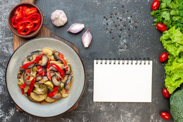 Top view cooked vegetables with greens