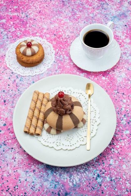 Top view cookies and cake with cup of coffee on the colored background sugar sweet cookie dough coffee