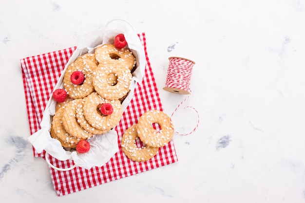 Top view of cookies with raspberries