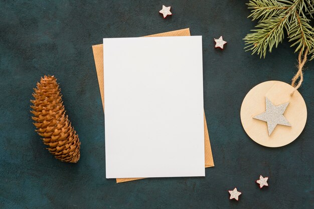 Top view copy space stationery paper and conifer cone