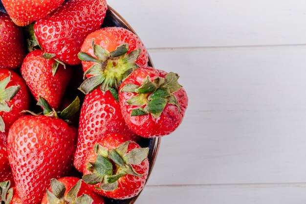 Top view copy space strawberry in a bowl