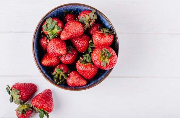 Top view copy space strawberry in a bowl